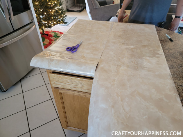 Learning how to cover a countertop with contact paper is easier than you think! It can last a long time if you're careful with it!