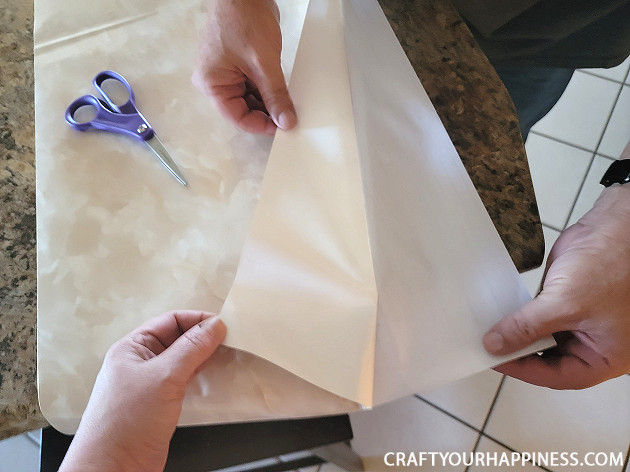 Learning how to cover a countertop with contact paper is easier than you think! It can last a long time if you're careful with it!