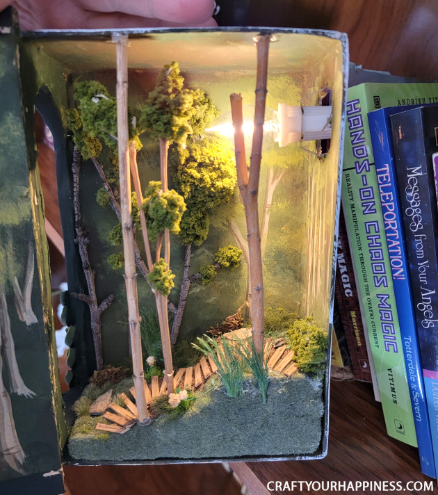 Check out this whimsical DIY book nook my daughter made to fit into my home office library! It's like a small slice of magic sitting on your shelf!