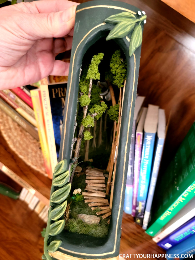 Check out this whimsical DIY book nook my daughter made to fit into my home office library! It's like a small slice of magic sitting on your shelf!