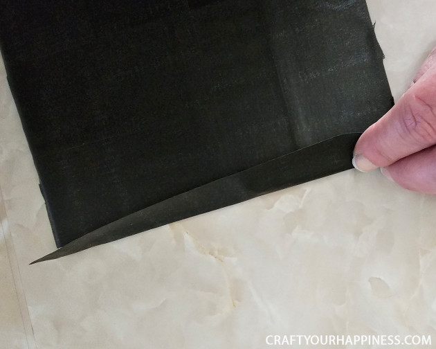 Learn how to make an inexpensive DIY craft cutting mat! It can be made any size and it's even reusable and self-healing.